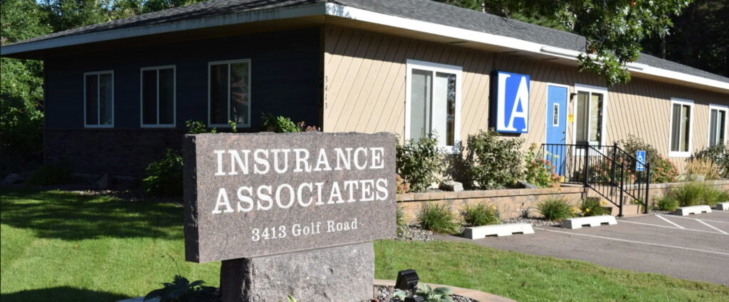 Front view with sign of Insurance Associates building